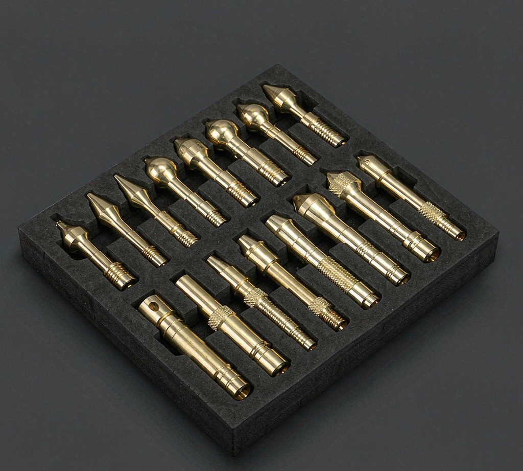 Cotton cleaning patch seated on a solid brass jag at the end of a cleaning rod Cotton cleaning patch seated on a solid brass jag at the end of a cleaning rod