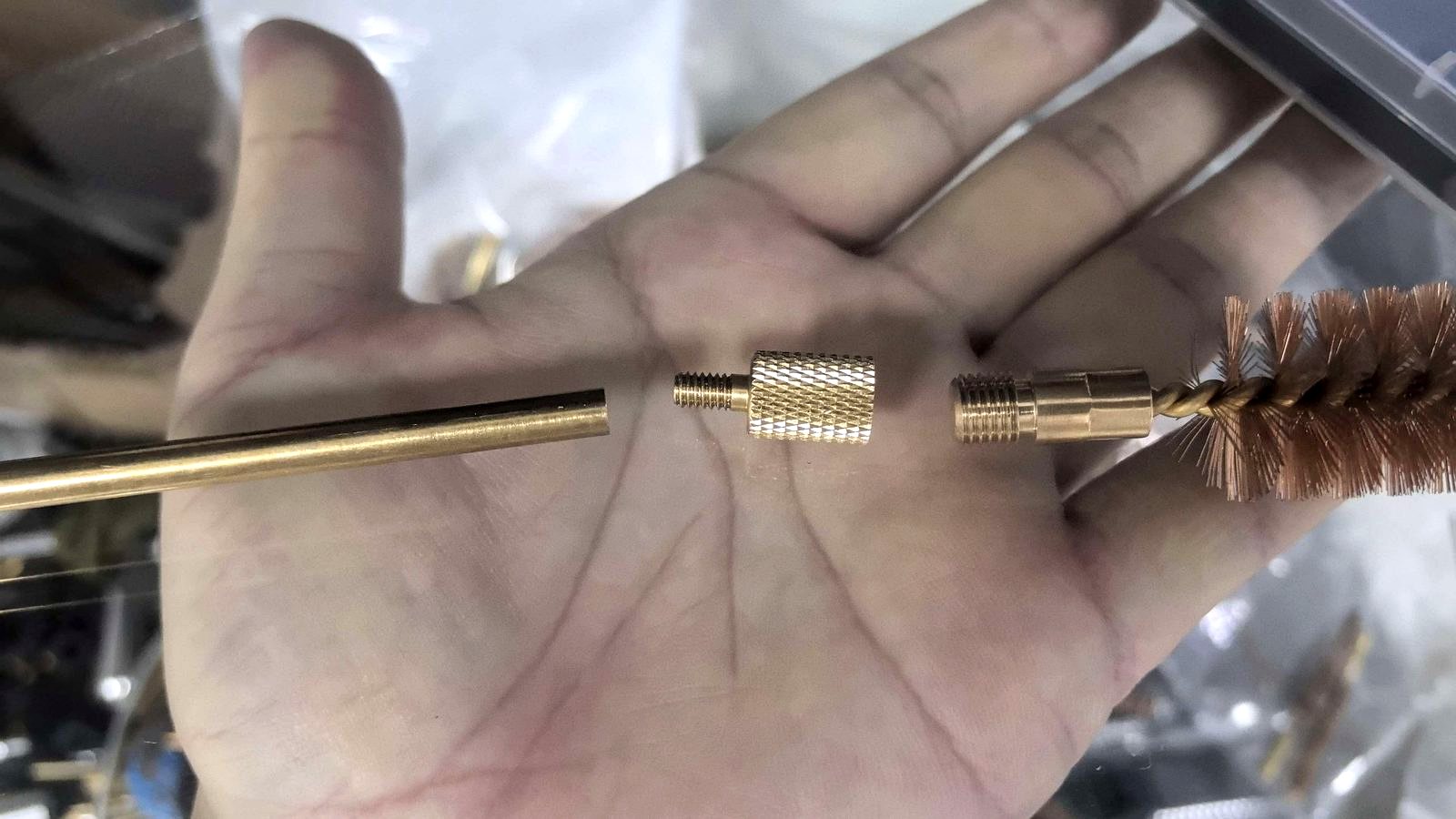 Hand assembly and inspection of brass cleaning rods